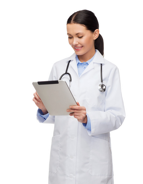 Female doctor with stethoscope and tablet pc - Valokuva, kuva