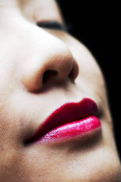Close-up of a woman's face with makeup - Fotó, kép