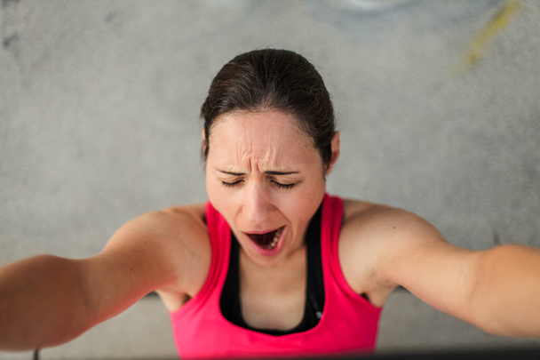 slim sporty woman at outdoor fitness workout - Fotó, kép