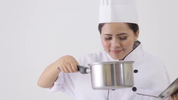 female chef with her cooking - Video