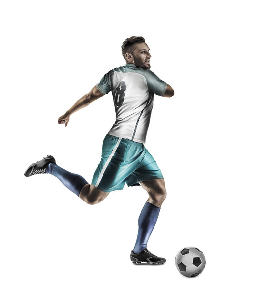 Young man playing football on white background - Foto, Bild