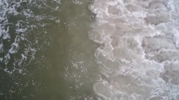 Blue water ocean wave blue swells crashing curling breaking a wavy surface - Video, Çekim
