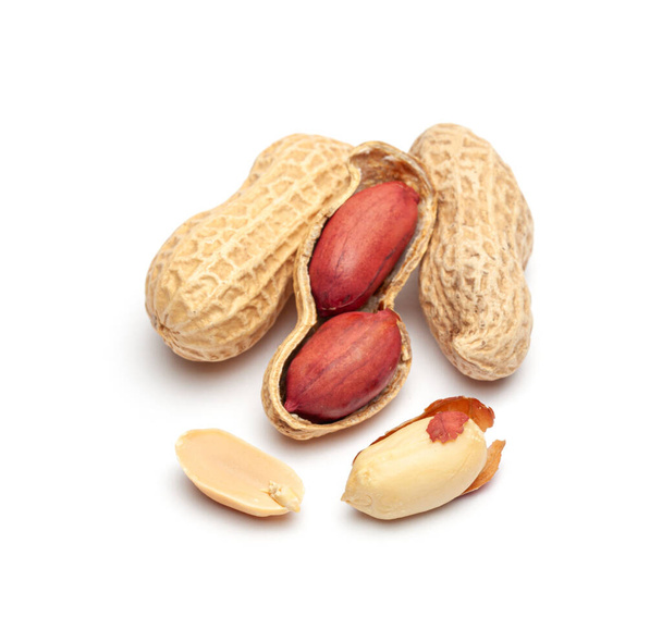 Dried peanuts in peel closeup isolated on white background - Photo, Image
