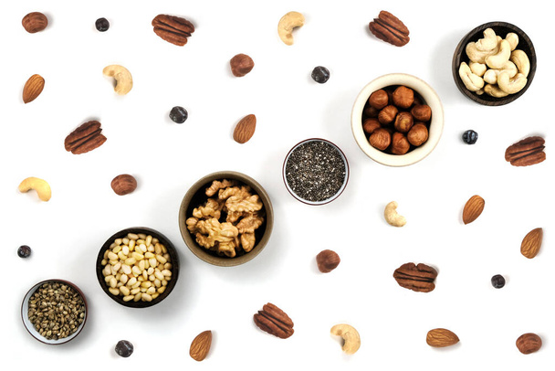 Nuts in round cup, top view close up. - Foto, imagen