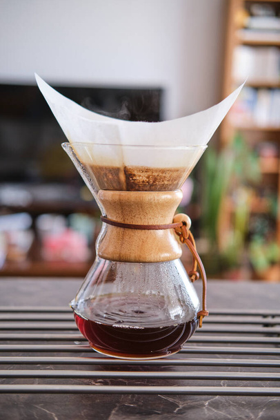 Istanbul, Turkey / May 2020 / Chemex filter coffee brewing method. Brewing coffee at home. Concept for home baristas. - Fotoğraf, Görsel
