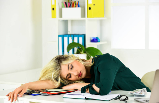 Workaholic concept. Energy and tiredness. Girl fell asleep on table. Pretty woman sleep at workplace. Exhausted beautiful lady sleep at work. Tired business lady sleep in office. Sleeping beauty - Foto, Bild