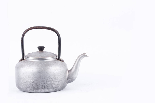 old vintage retro Kettle on white background drink isolated . Which, kettle made of aluminum materials. - Photo, Image