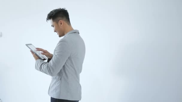 Asian Young Business with tablet - Metraje, vídeo