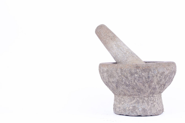 argamassa de pedra e pilão são ferramenta de cozinha tailandesa em alimentos de fundo branco isolado
  - Foto, Imagem