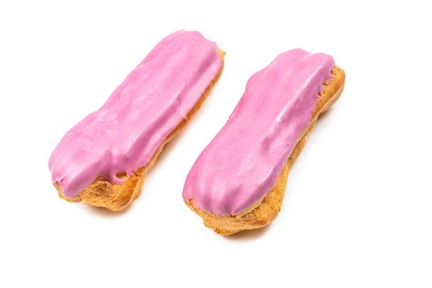 Fresh tasty eclairs isoalted on white background. Top view.  - Photo, Image