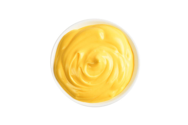Cheese sauce in white plate on white background. - Photo, Image