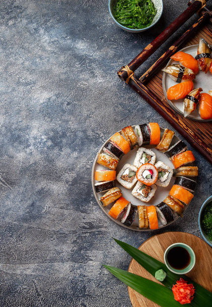 Sushi and rolls sets. Japonese food. top view - Zdjęcie, obraz