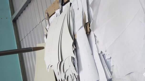 espacios en blanco para la ropa en una fábrica
 - Imágenes, Vídeo