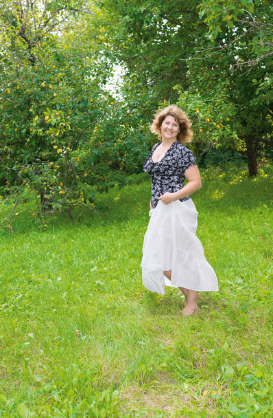 Middle-aged woman in the park - Fotó, kép