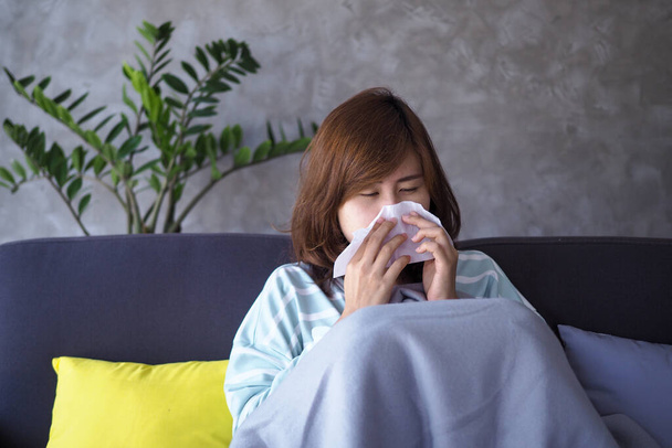 Asian women have high fever and runny nose. sick people concept - Photo, Image