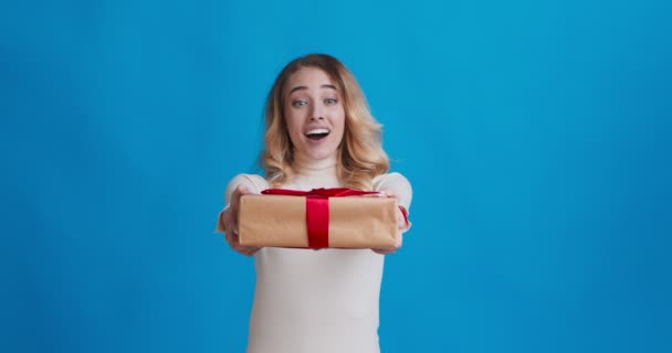 Happy woman getting gift, enjoying big present box - Video