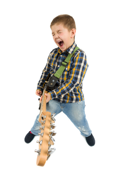 Young guitarist playing guitar - Photo, Image