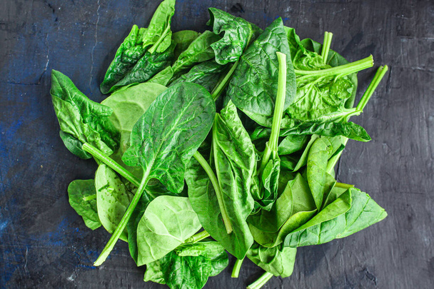 spinach fresh green petals Menu concept healthy eating. food background top view copy space for text healthy eating table setting keto or paleo diet organic - Photo, Image