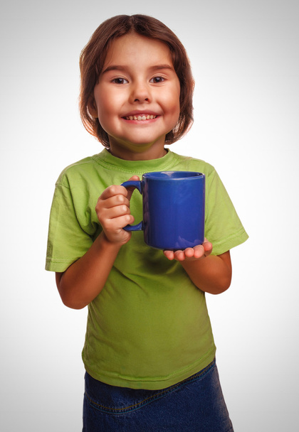 Young little baby girl drinking milk glass mug coffee tea hot dr - Fotó, kép