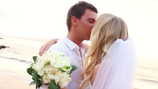Bride and Groom on Beautiful Tropical Beach at Sunset - Footage, Video
