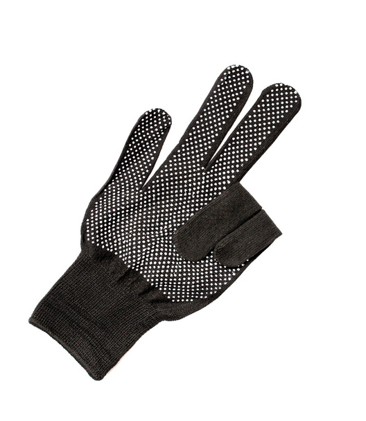 Black work glove isolated on white background. - Photo, Image