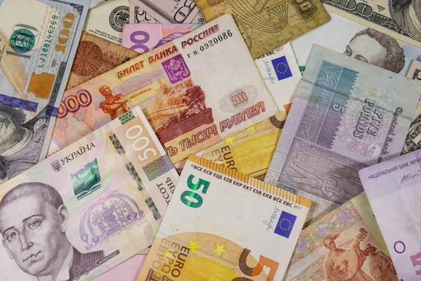 Wielokulturowe tło euro Nas dolary, ruble rosyjskie, funty egipskie i ukraińskie hrywny - Zdjęcie, obraz