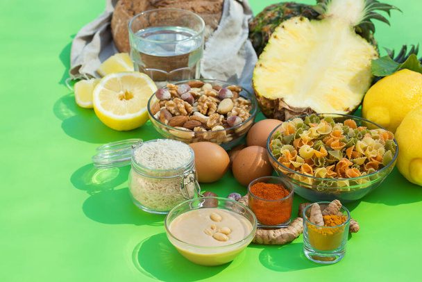 Balanced nutrition concept for low purine eating and diet to stop gout. Assortment of healthy food ingredients for cooking on a kitchen table - Photo, Image
