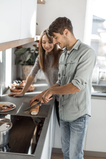 young couple is preparing Breakfast in their kitchen. - Photo, image