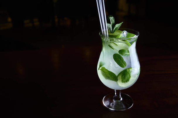 Transparent cocktail with ice and decoration - 写真・画像