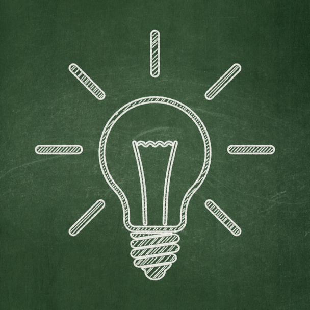 Business concept: Light Bulb on chalkboard background - Zdjęcie, obraz