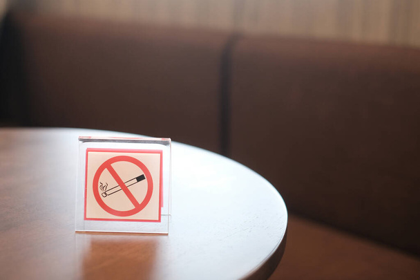 no smoking sign on table with copy space for design - Photo, Image