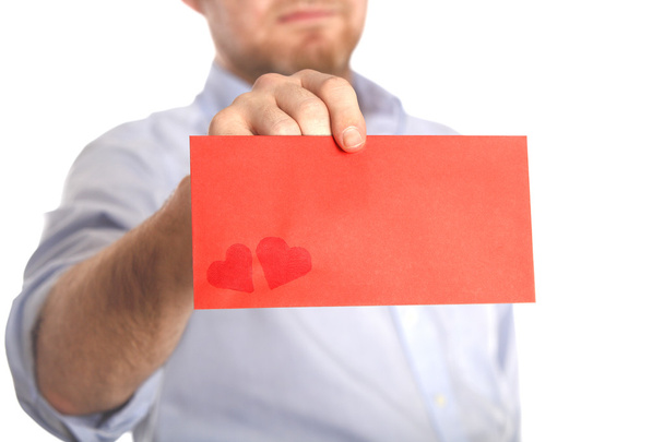 Мужчина держит любовное письмо
 - Фото, изображение