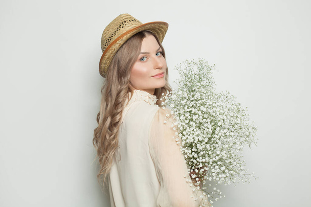 Beautiful woman with flowers on white banner background - Valokuva, kuva