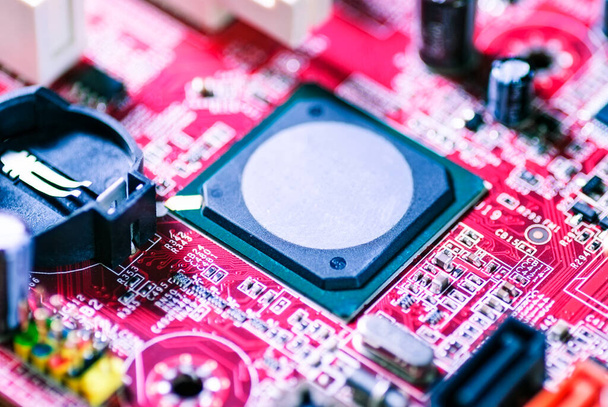 Computer chip in the motherboard, closeup shot, top view. - Φωτογραφία, εικόνα