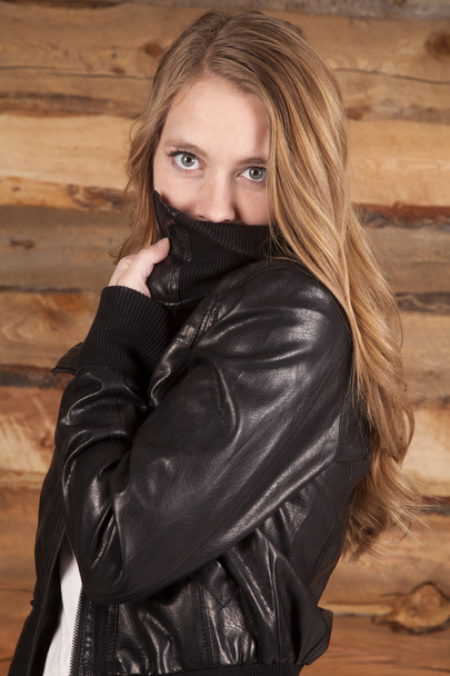 woman leather wood background look over - 写真・画像