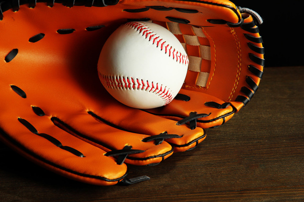 Baseball glove and ball on dark background - Foto, Imagem