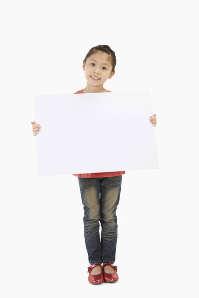 Girl holding blank placard - Foto, immagini