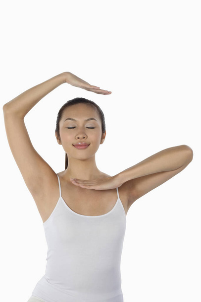young woman practicing yoga - Fotó, kép