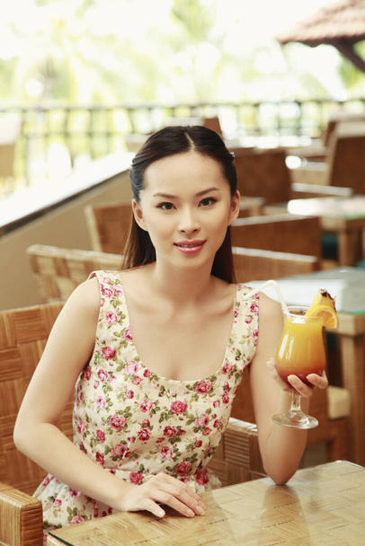 Woman with a glass of fruit juice - Photo, Image