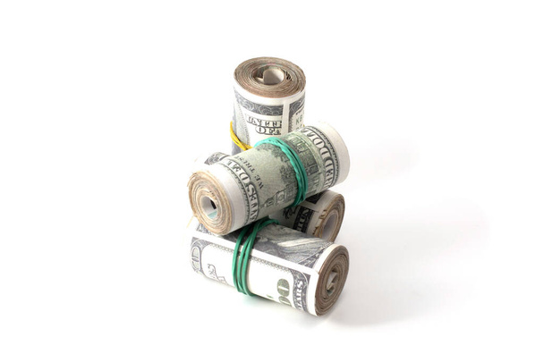 rolls of money are tied with a rubber band isolated - Photo, Image