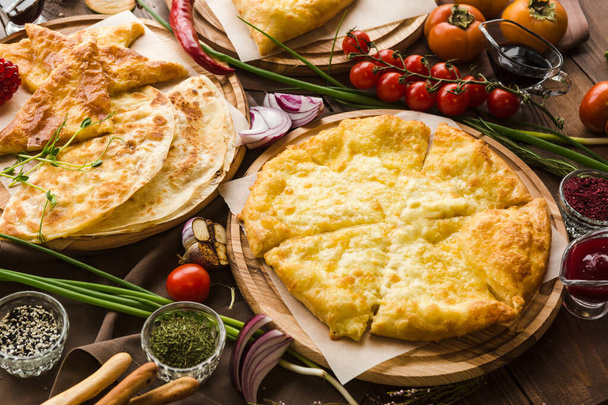 variety of restaurant dishes of national Georgian Armenian and Azerbaijani cuisine - Foto, Imagen