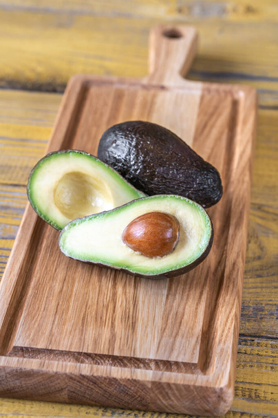 Fresh avocado on the wooden board - Photo, Image