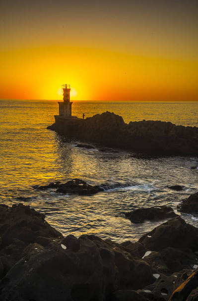  Lighthouse at sunset in Pasajes San Juan near San Sebastian, Guipuzcoa. Basque Country - Foto, imagen