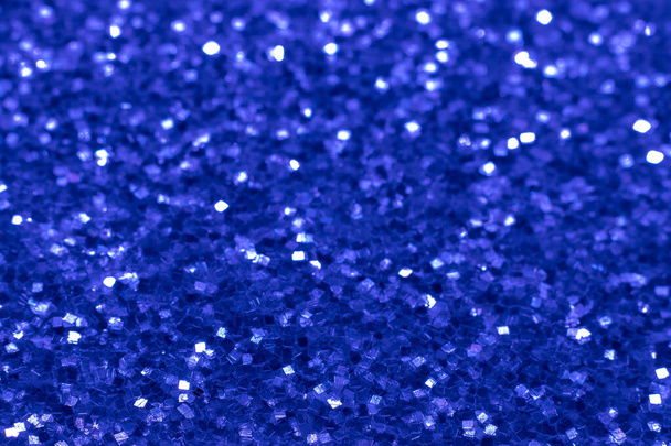 Blue glitter texture. Festive sparkling sequins background closeup. Brilliant shiny walpaper for the day of St. Valentine, New Year and Christmas Holidays. - Photo, Image