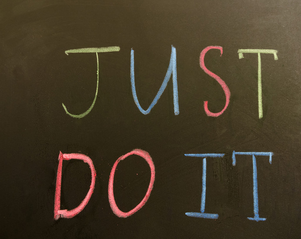 Sign "Just do it!" on the blackboard - Foto, afbeelding