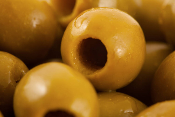 Green pickled olives background - Photo, Image