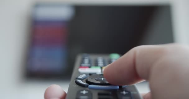 Controlling smart tv with a remote control - Footage, Video