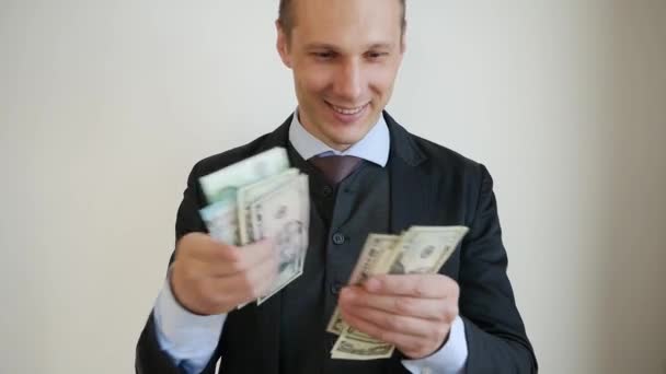 Happy Businessman Dancing With Money On White Background. - Záběry, video