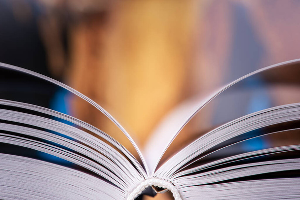 Open book close-up with soft blur background - Fotó, kép