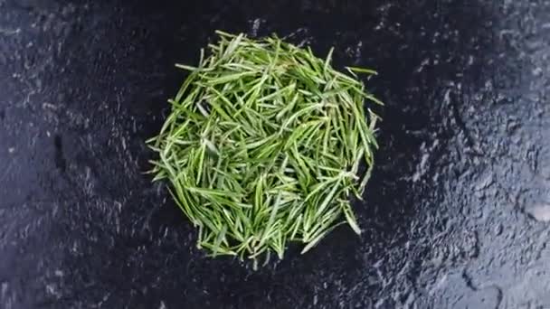 Heap of fresh rosemary on dark background, top view - Footage, Video